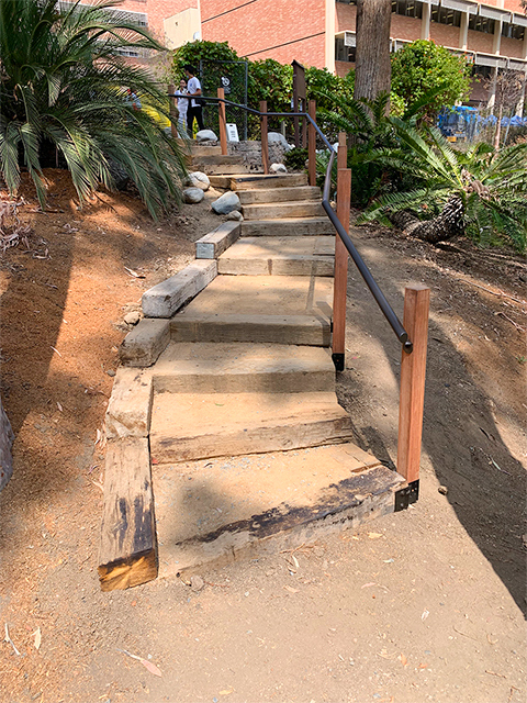 new botanical garden entrance with handrail and steps 
